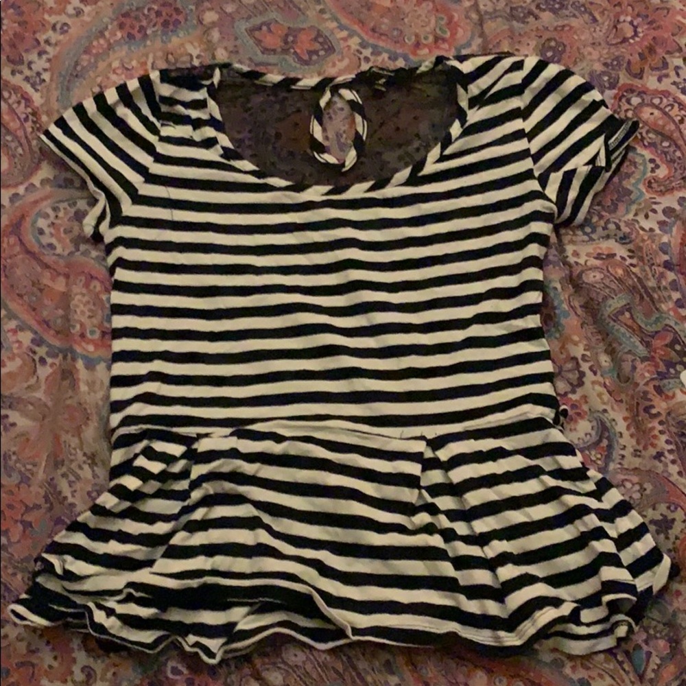Black and creamish colored see through back shirt